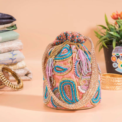 Flamingo Pink Brocade Ambi Potli Bag.