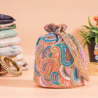 Flamingo Pink Brocade Ambi Potli Bag.