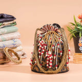 Black Jazz Golden Floral Brocade Potli Bag.