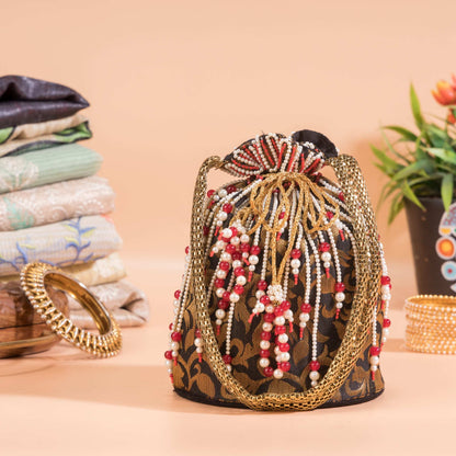 Black Jazz Golden Floral Brocade Potli Bag.