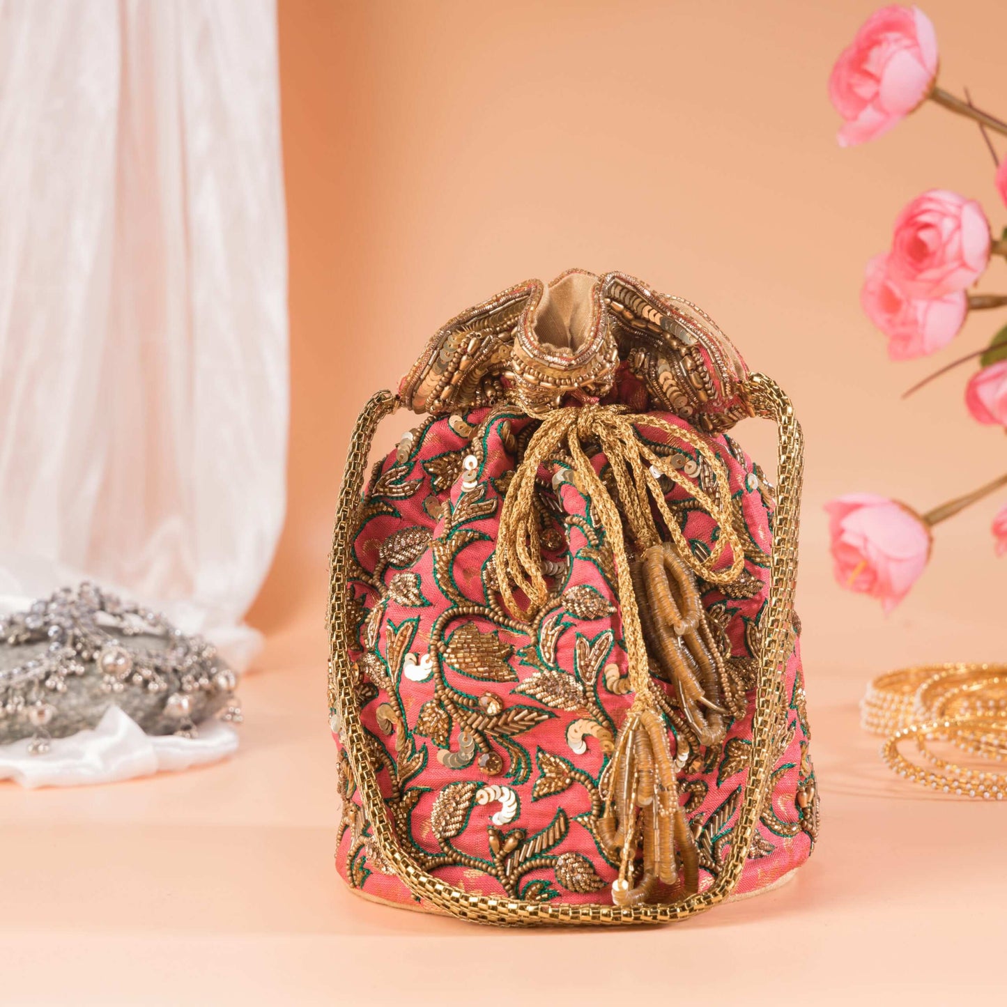 Peach Golden Floral Brocade Zari Potli Bag.