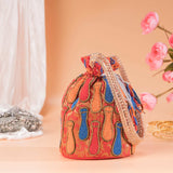 Red Hot Brocade Surai Potli Bag.