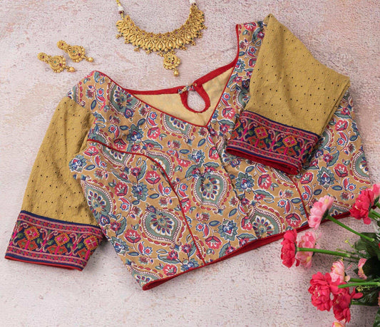 Beige floral embroidered blouse.