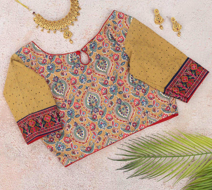 Beige floral embroidered blouse.