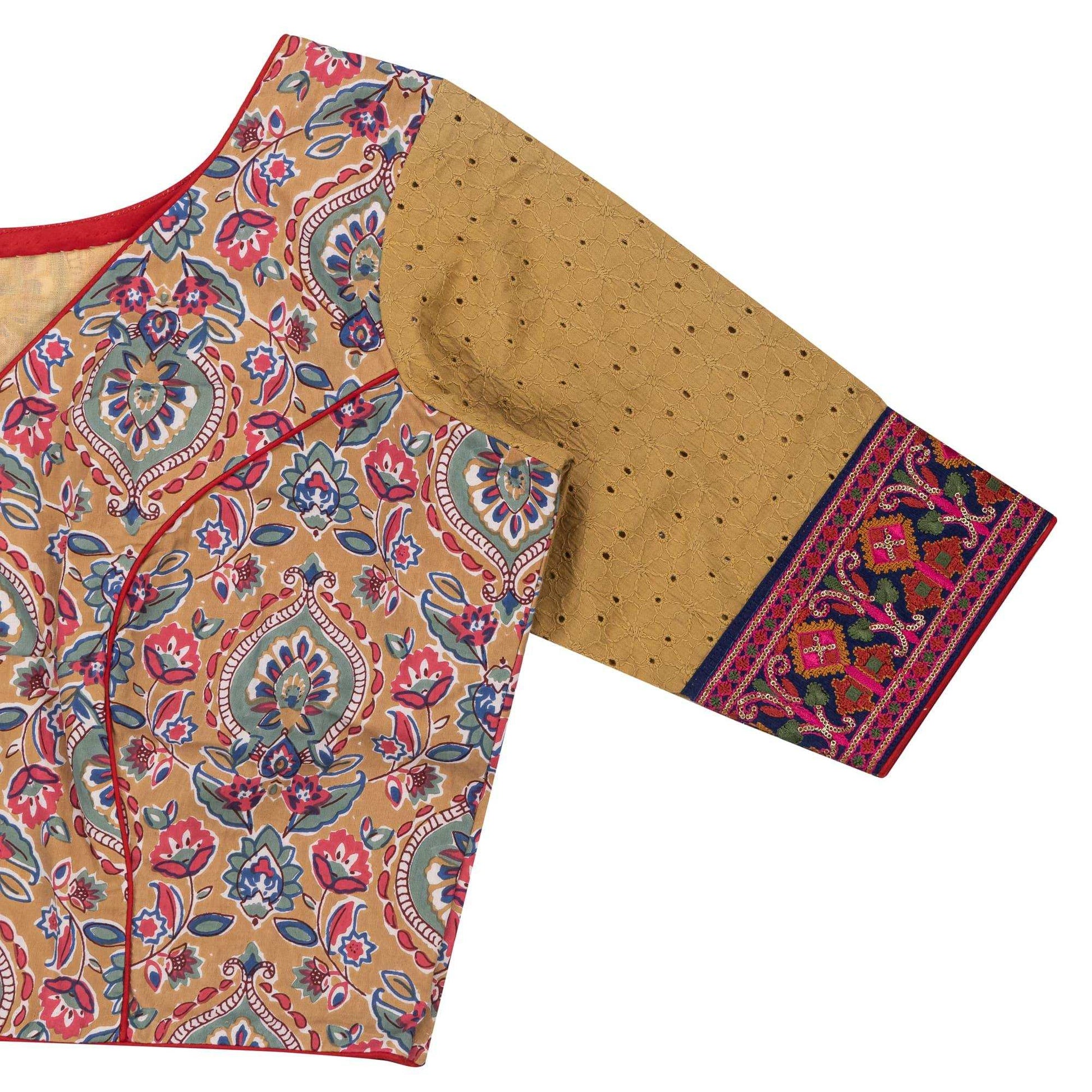 Beige floral embroidered blouse.