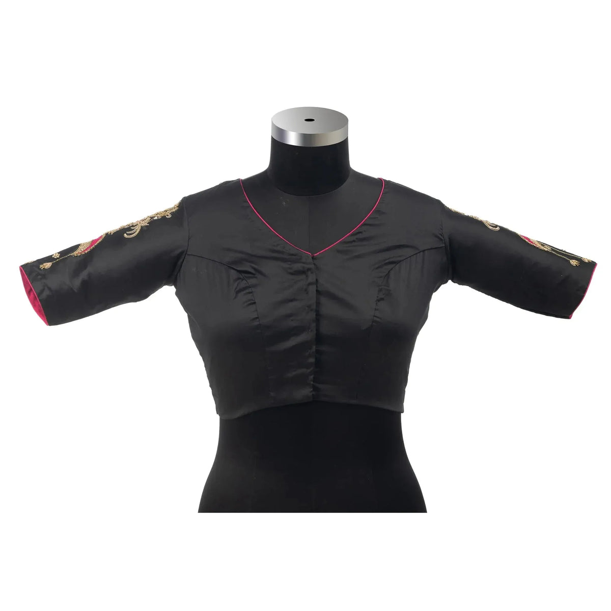 Front of the blouse on a bust form, pink-piped V neck and elbow-length sleeves