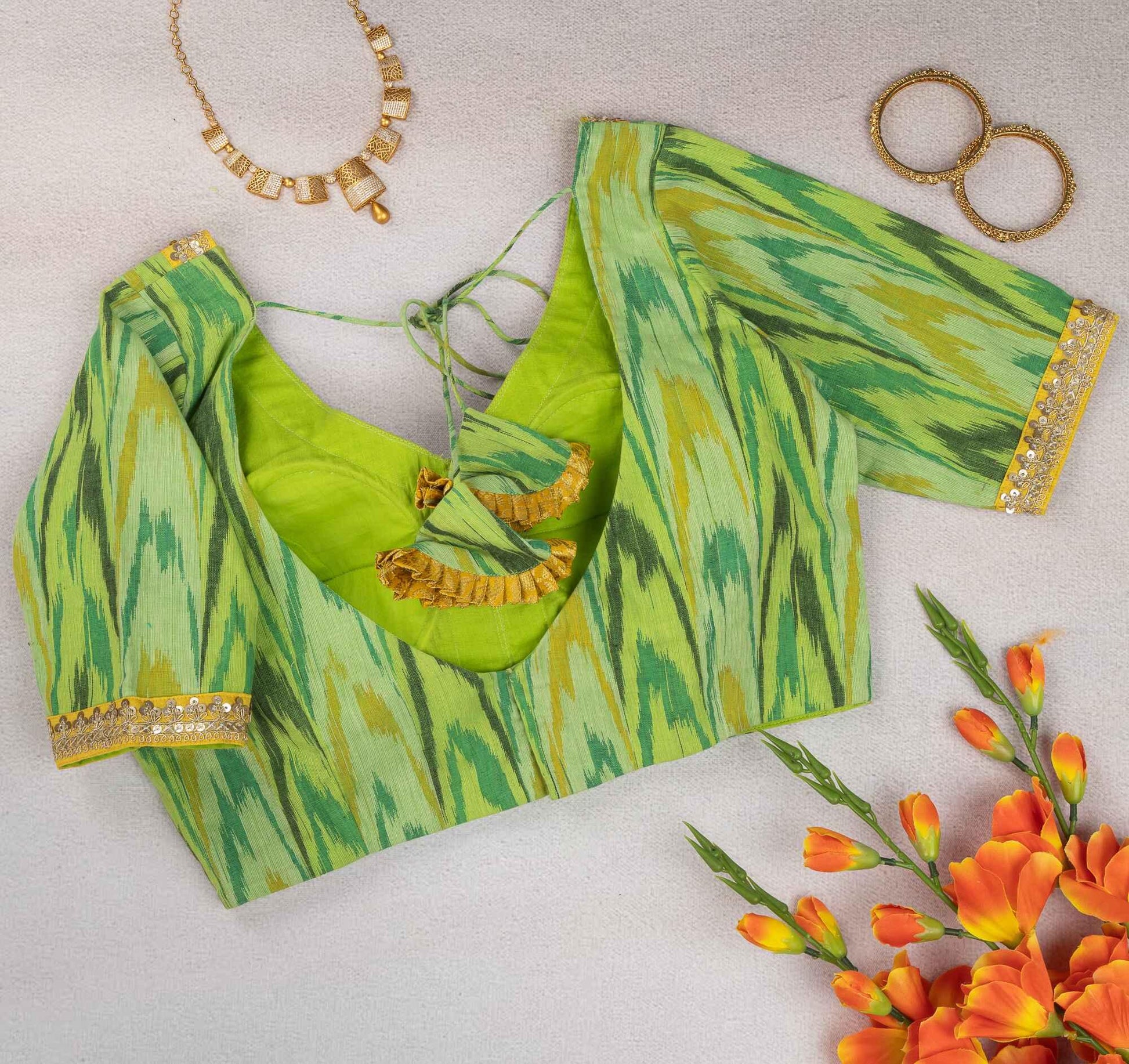 Greenish Ikkat Shade Blouse – Cotton Comfort with Ikkat Accents.