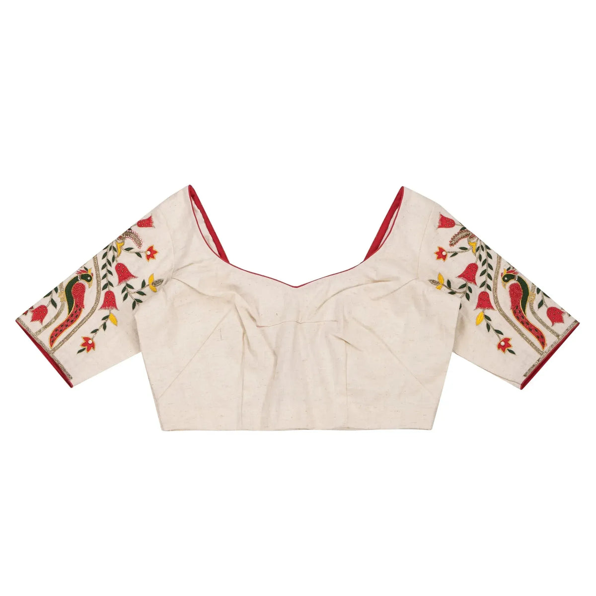 Ivory blouse laid flat front up, sweetheart neckline and mayur motif sleeves