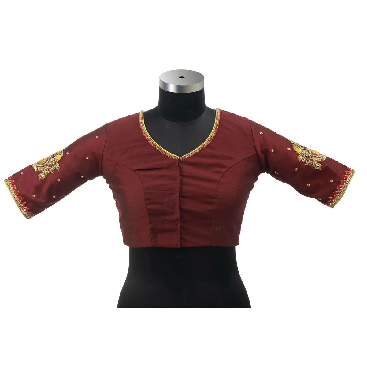 Plain V-neck side of the maroon blouse on a bust form with hook opening