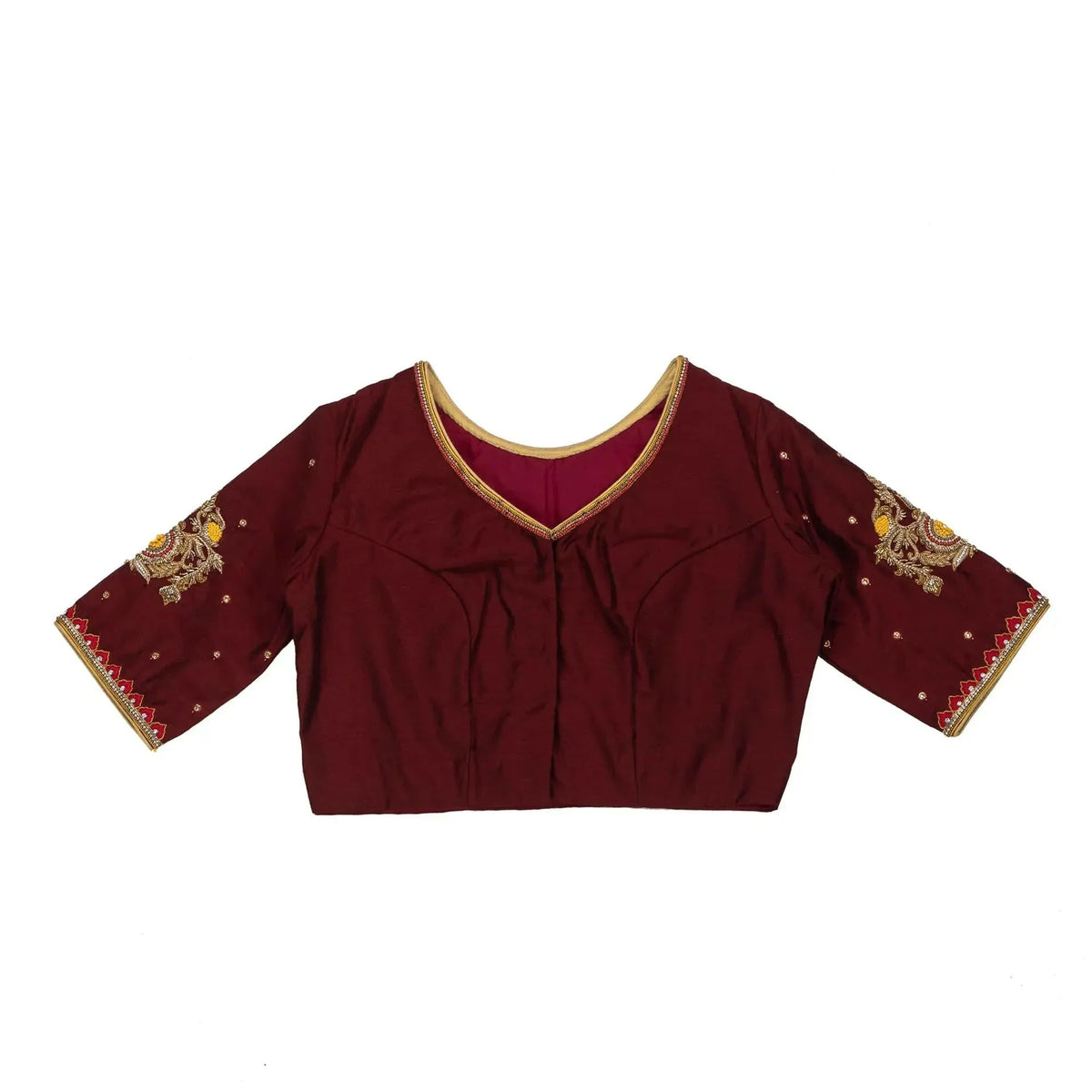 Plain panel of the maroon blouse photographed flat against white, V neck and gold piping