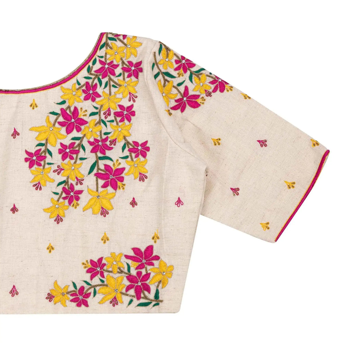 Close-up of the pink and yellow floral embroidery across the shoulder and sleeve