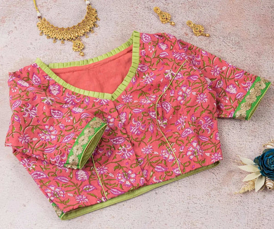 Peachish Pink Floral Cotton Blouse – Elegant Pleated V-Neck Design.