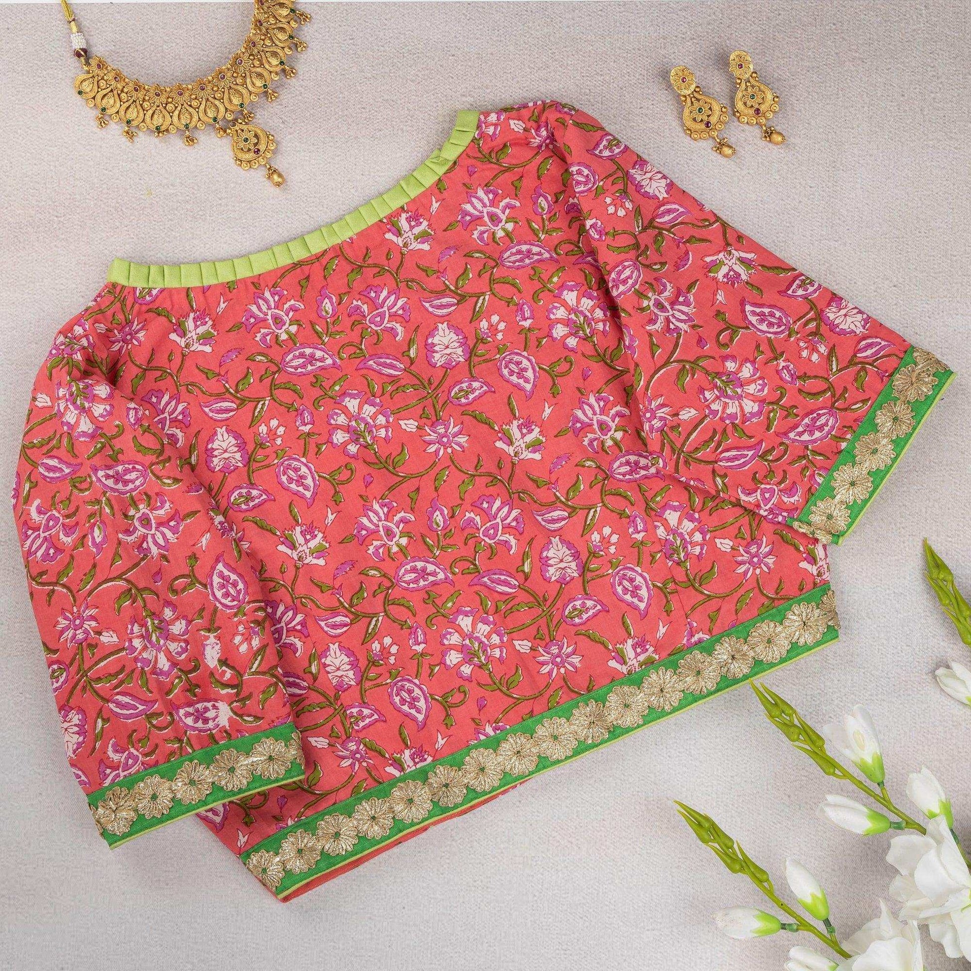 Peachish Pink Floral Cotton Blouse – Elegant Pleated V-Neck Design.