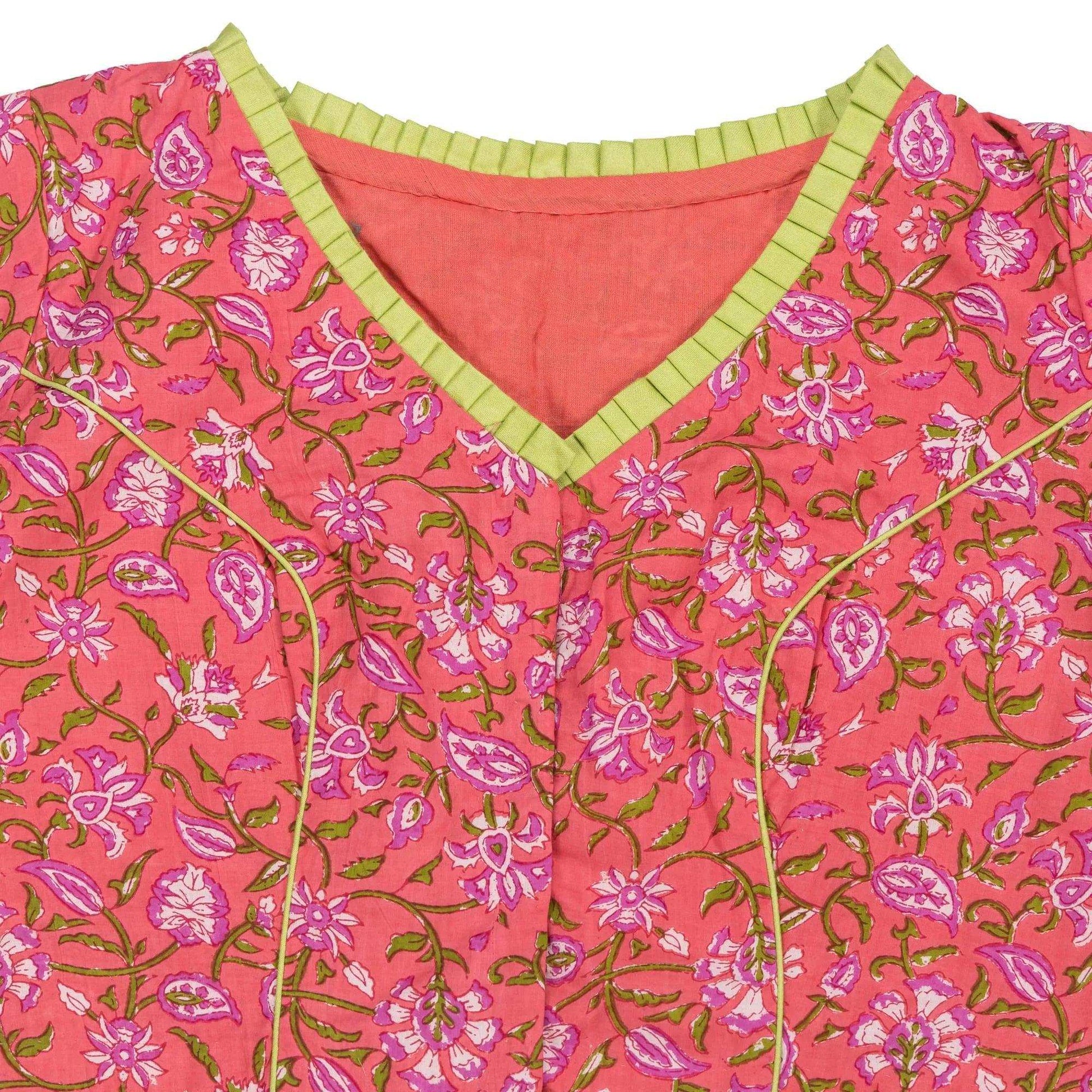 Peachish Pink Floral Cotton Blouse – Elegant Pleated V-Neck Design.