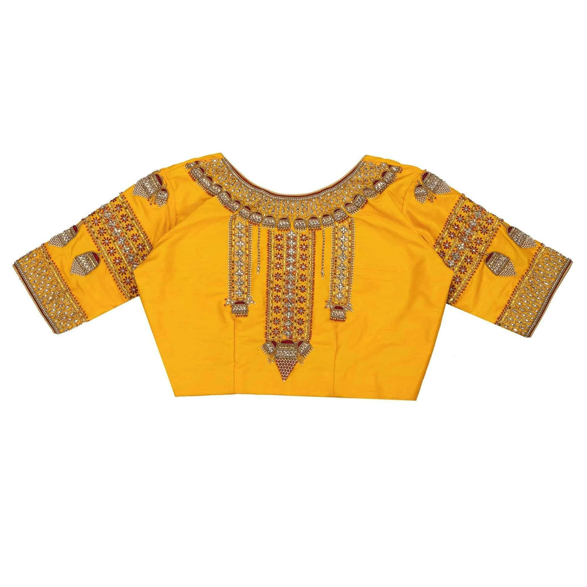 Embroidered back of the yellow blouse spread flat on white