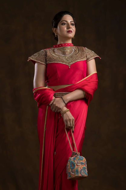 Flamingo Pink Brocade Ambi Potli Bag.