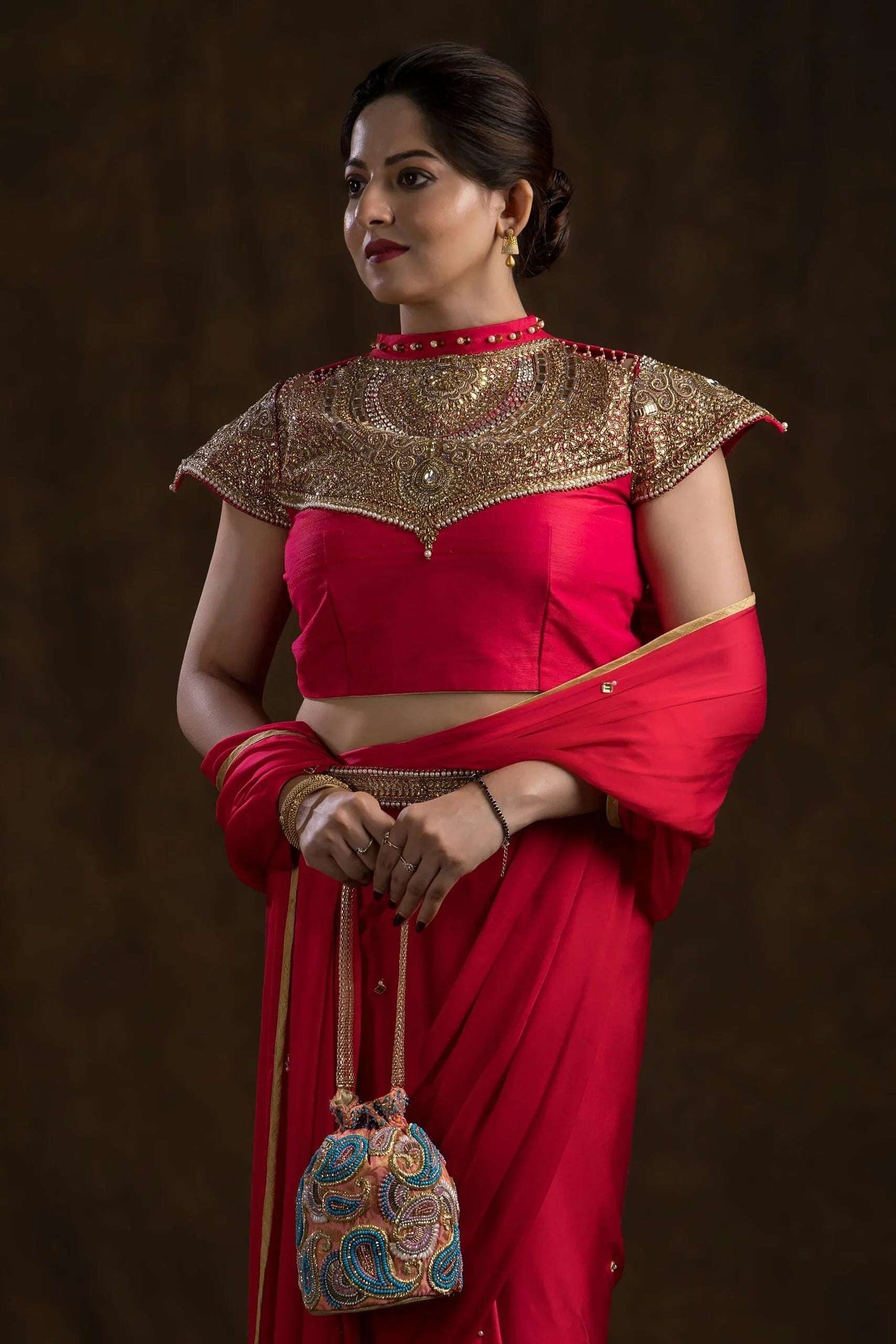 Flamingo Pink Brocade Ambi Potli Bag.