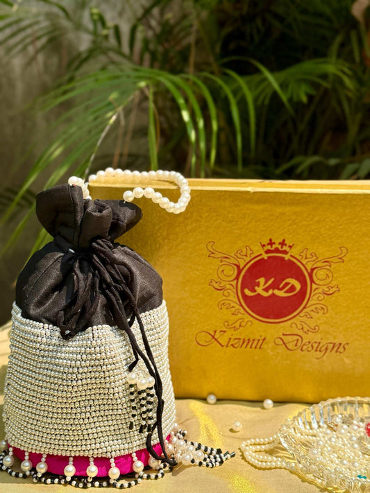 MOTI MALLIKA HAND EMBROIDERED POTLI BAG.