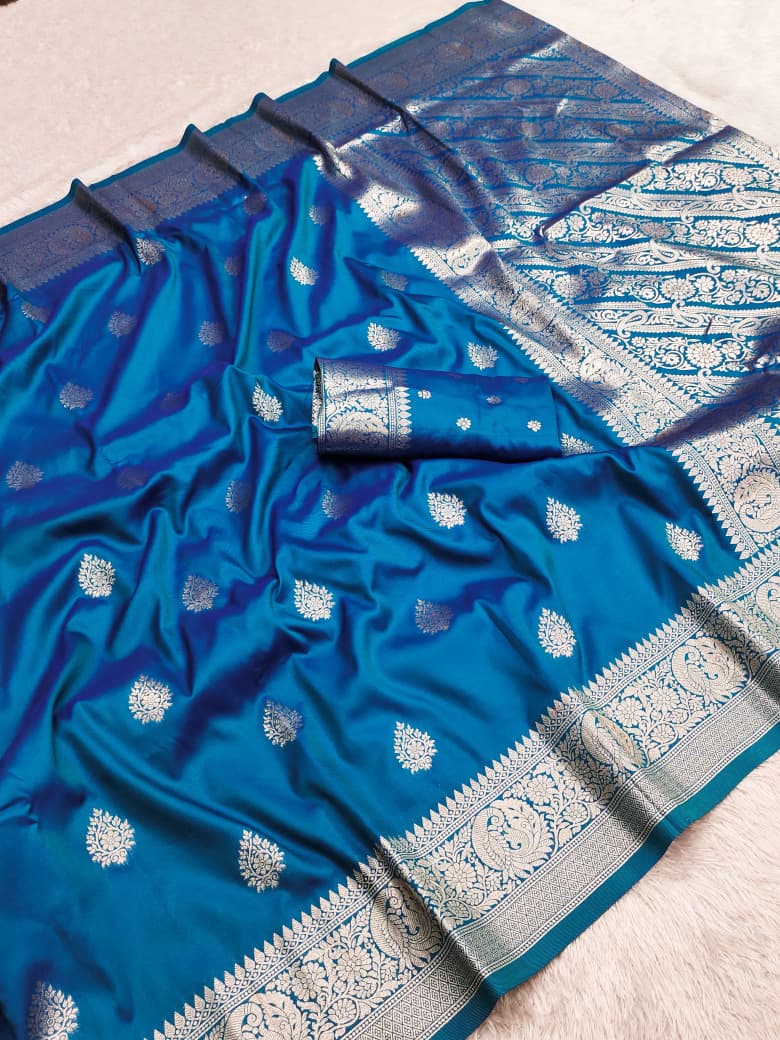 Peacock blue Banarasi soft silk saree with allover zari buta and rich paisley pallu