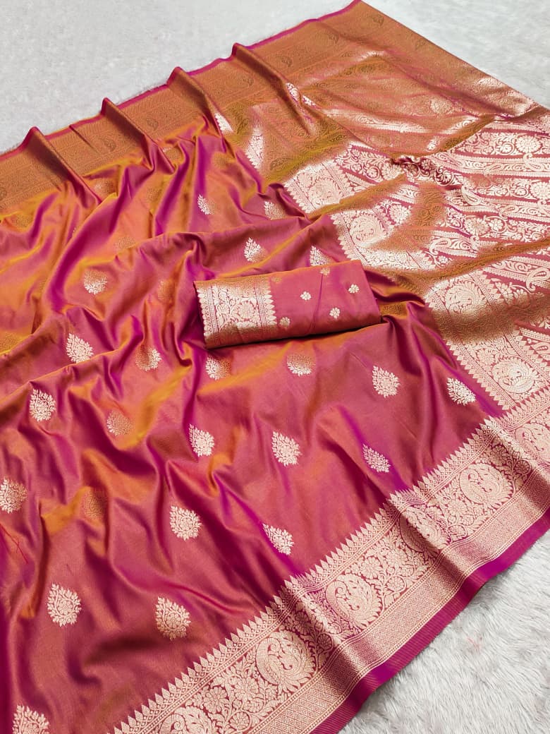 Coral dual-tone shot silk Banarasi saree with allover gold zari buta and rich paisley pallu