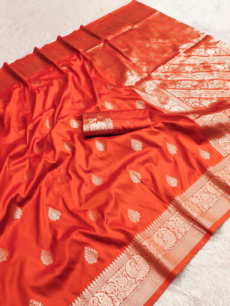 Rust orange Banarasi soft silk saree with allover gold zari buta and rich paisley pallu