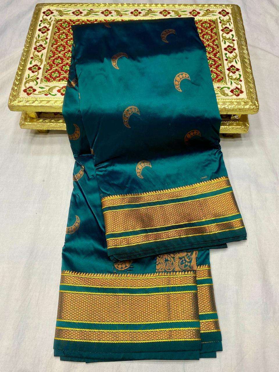 Chandrakor booti crescent moon motif detail on saree body