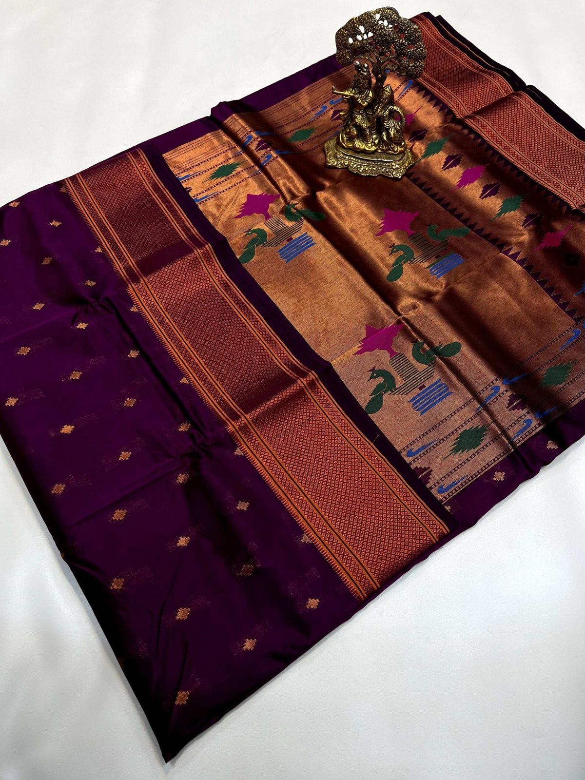 Wine purple Paithani pallu in copper zari with peacock and flower motifs