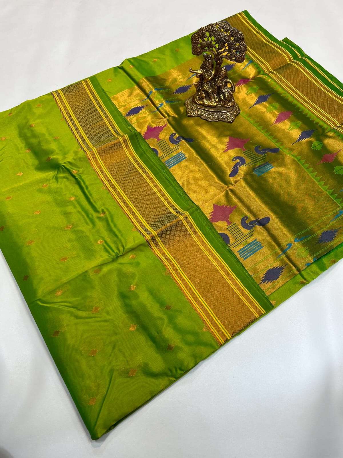 Parrot green Paithani pallu with peacock and flower motifs in gold zari