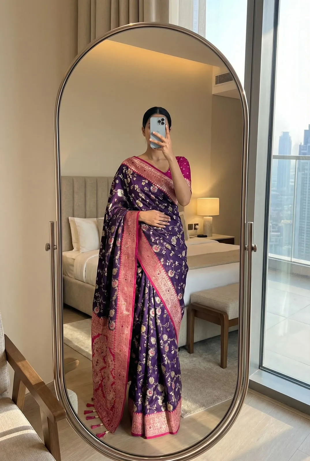 Deep purple soft silk saree with rani pink border, worn with a pink blouse
