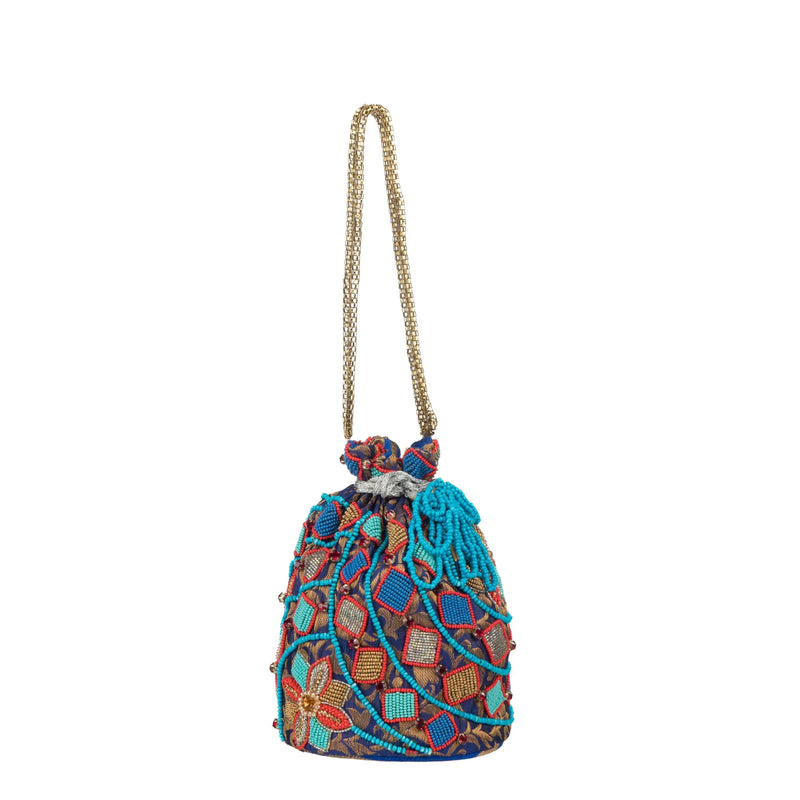 Egyptian blue potli bag on a gold chain, turquoise bead tassel at the drawstring