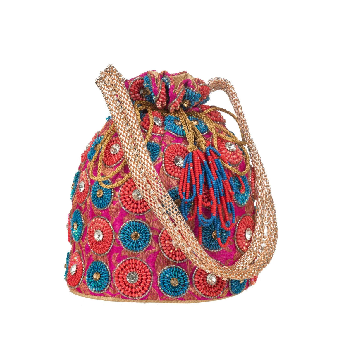 Front of the pink potli, gold cord handle looped and red beaded tassels at the top