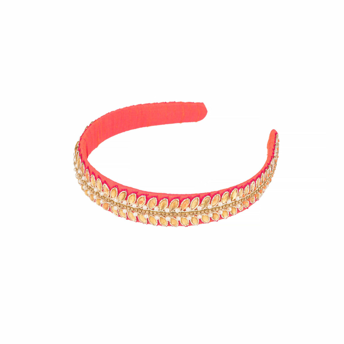 Full side view of the coral headband and its gold leaf embellished band on white