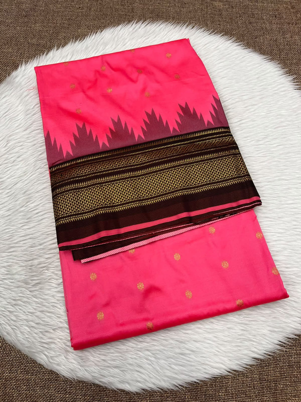 Ilkal silk saree in pink with a dark brown temple border and gold buttis