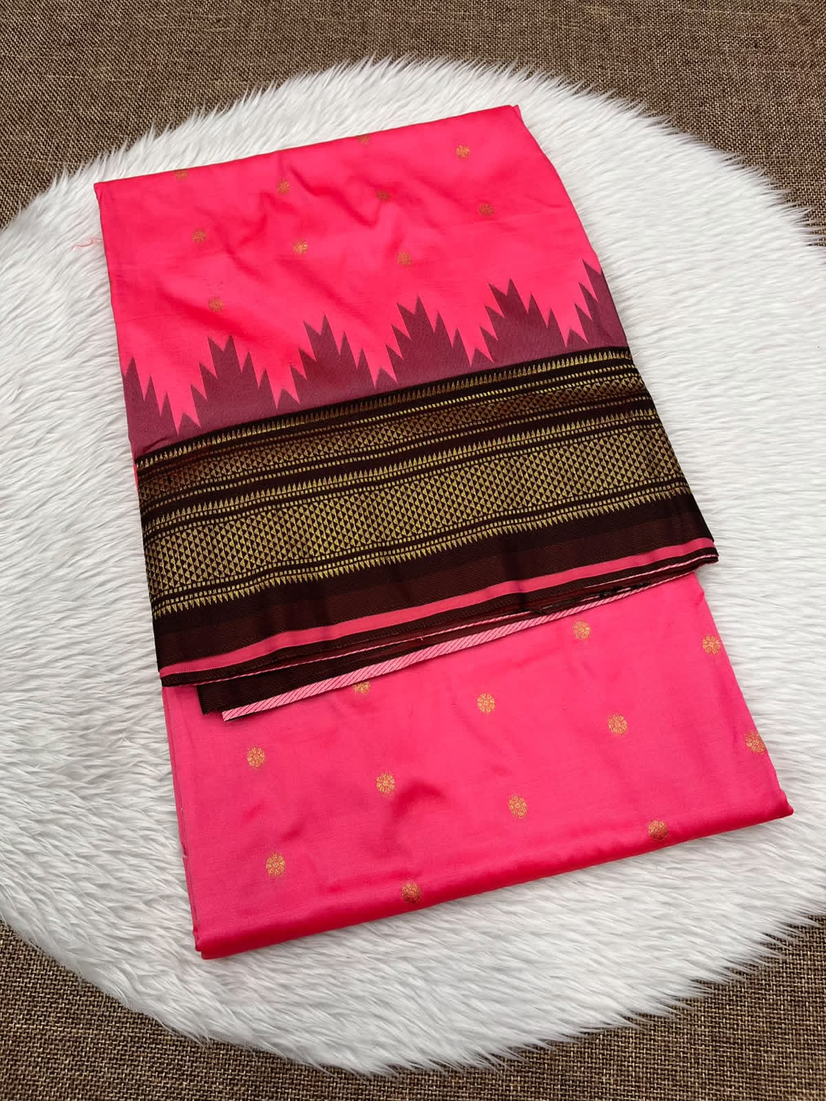 Ilkal silk saree in pink with a dark brown temple border and gold buttis