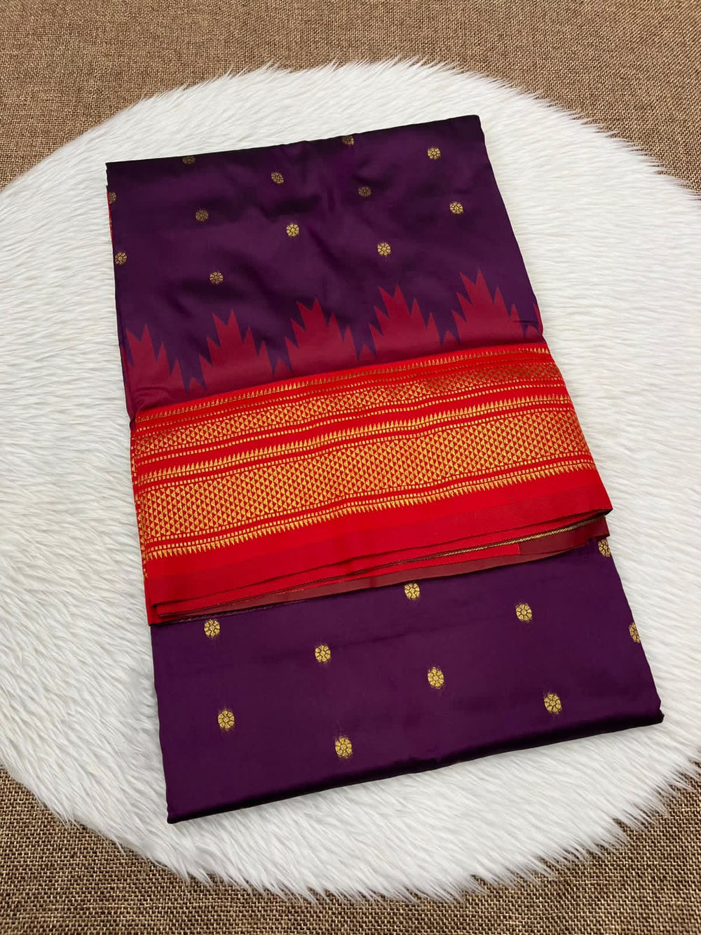Ilkal silk saree in purple with a red temple border and gold buttis