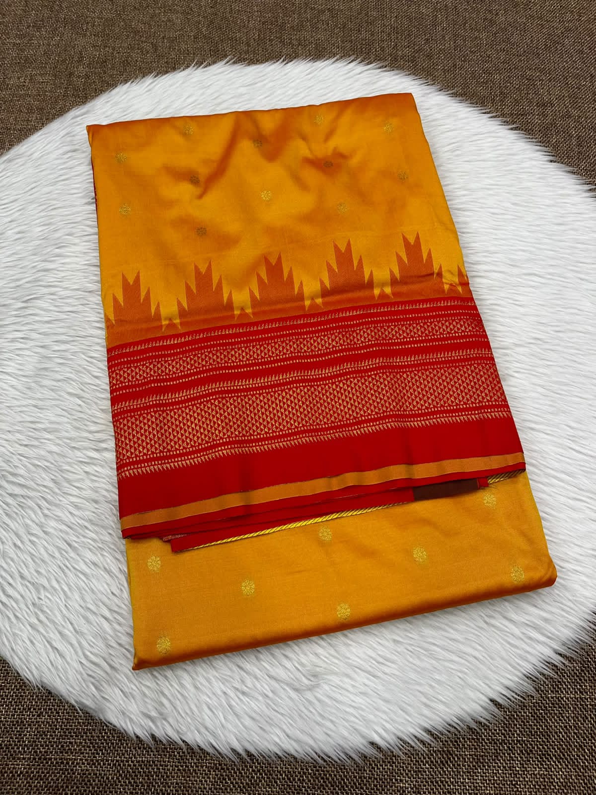 Ilkal silk saree in mustard with a red temple border and gold buttis