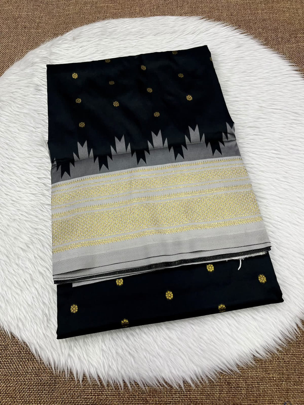 Ilkal silk saree in black with a grey and gold temple border