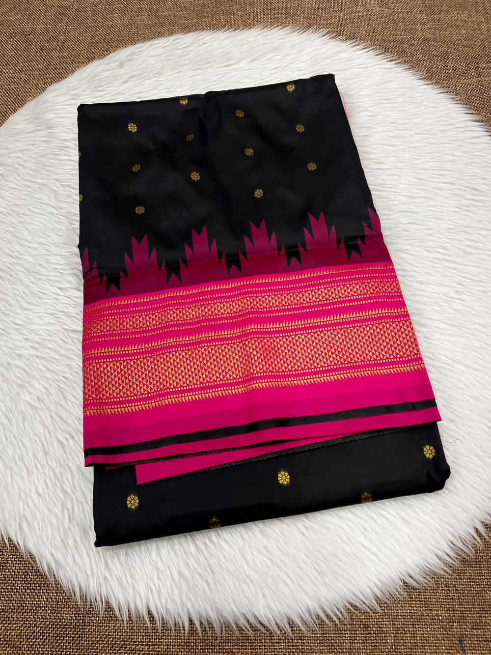 Ilkal silk saree in black with a pink temple border and gold buttis