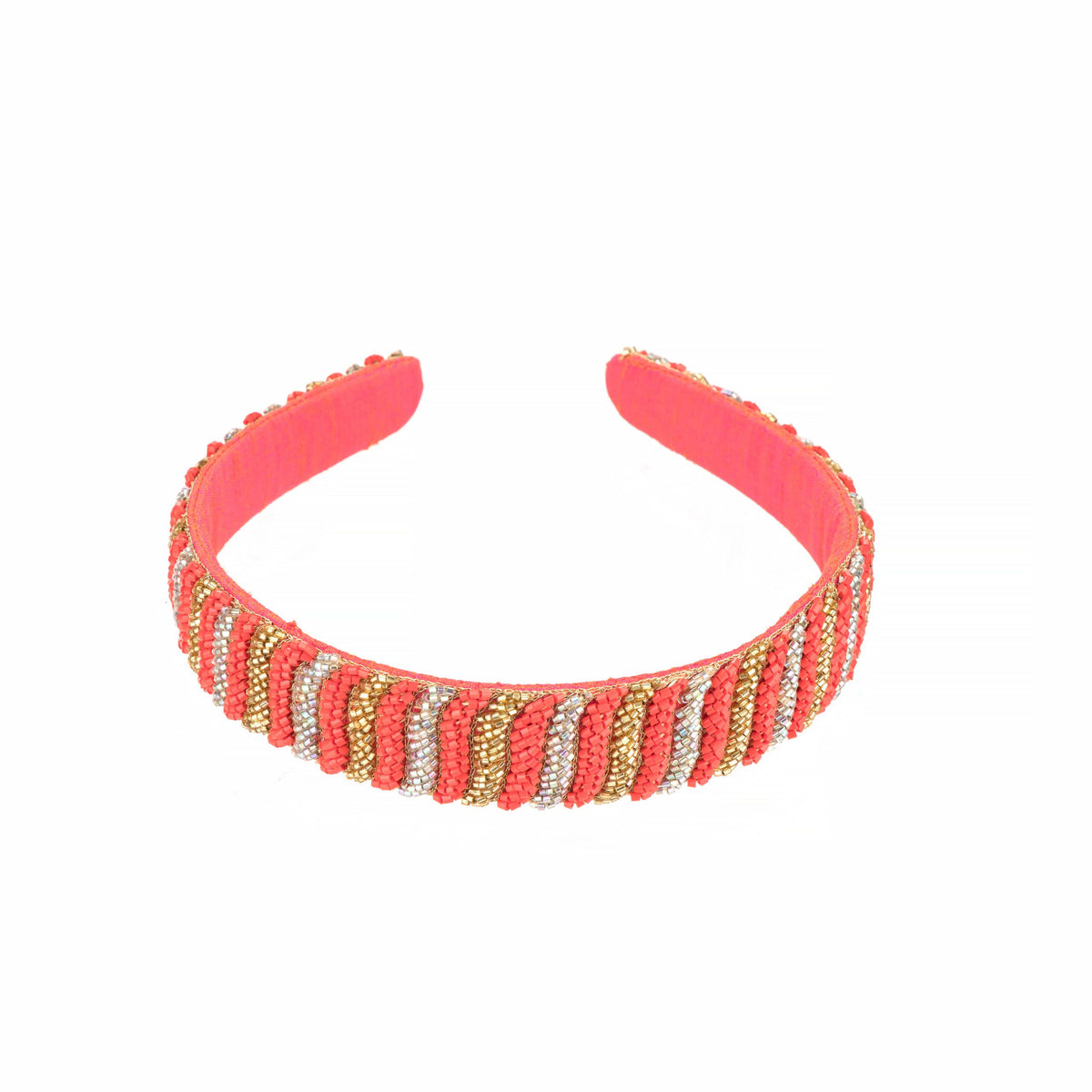 Hand-embroidered coral headband photographed head-on against white