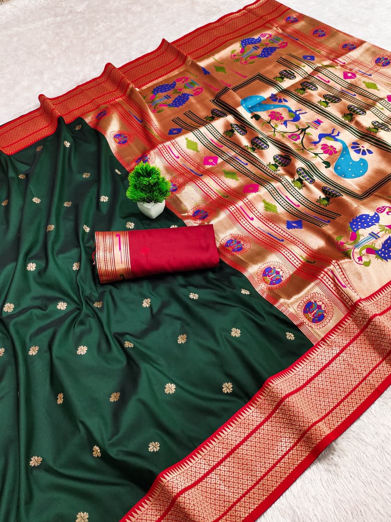 Kadiyal border soft silk saree in deep green with a red border and gold zari peacock pallu