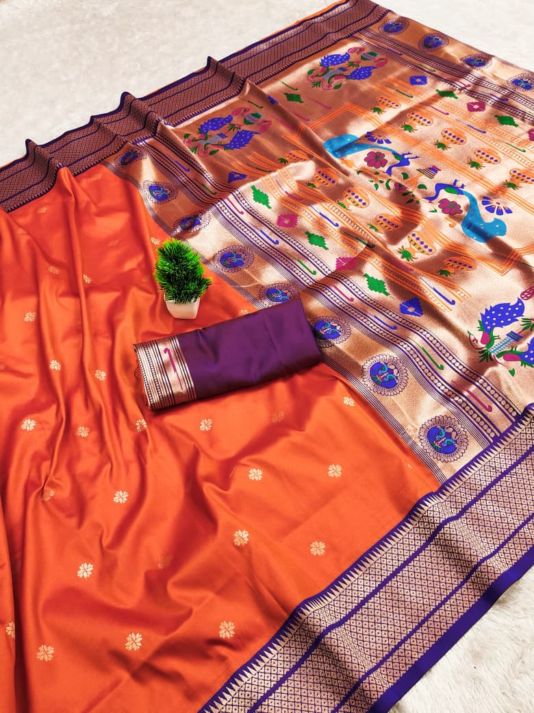 Kadiyal border soft silk saree in marigold orange with a violet border and gold zari peacock pallu