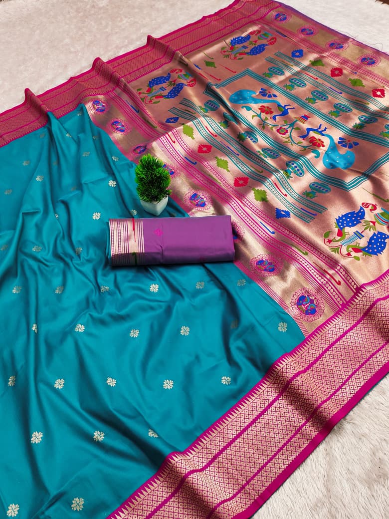 Kadiyal border soft silk saree in turquoise teal with a pink border and gold zari peacock pallu