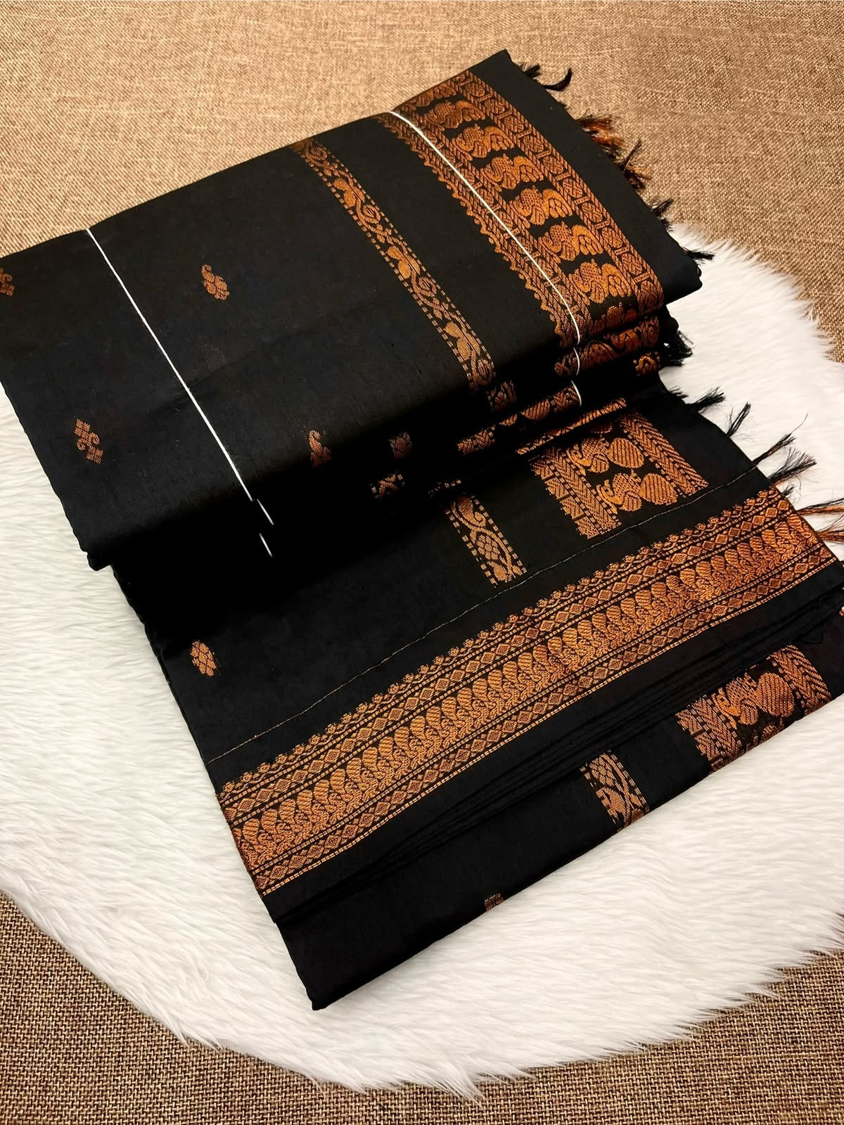 Black Kalyani cotton Gadwal saree with copper zari contrast border