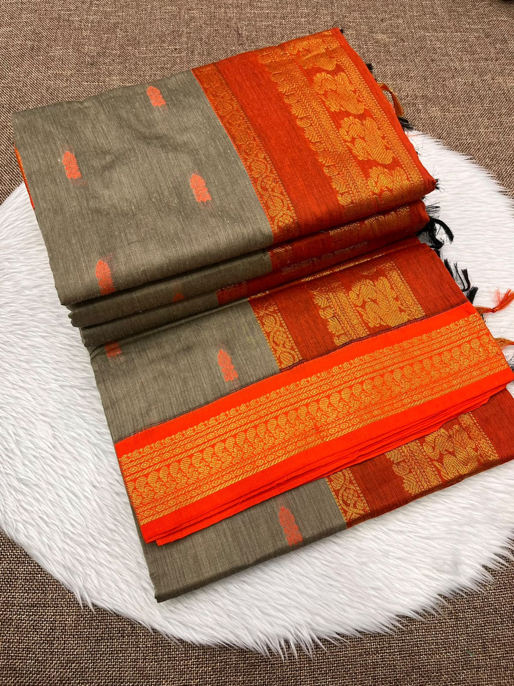 Khaki Kalyani cotton Gadwal saree with orange contrast border