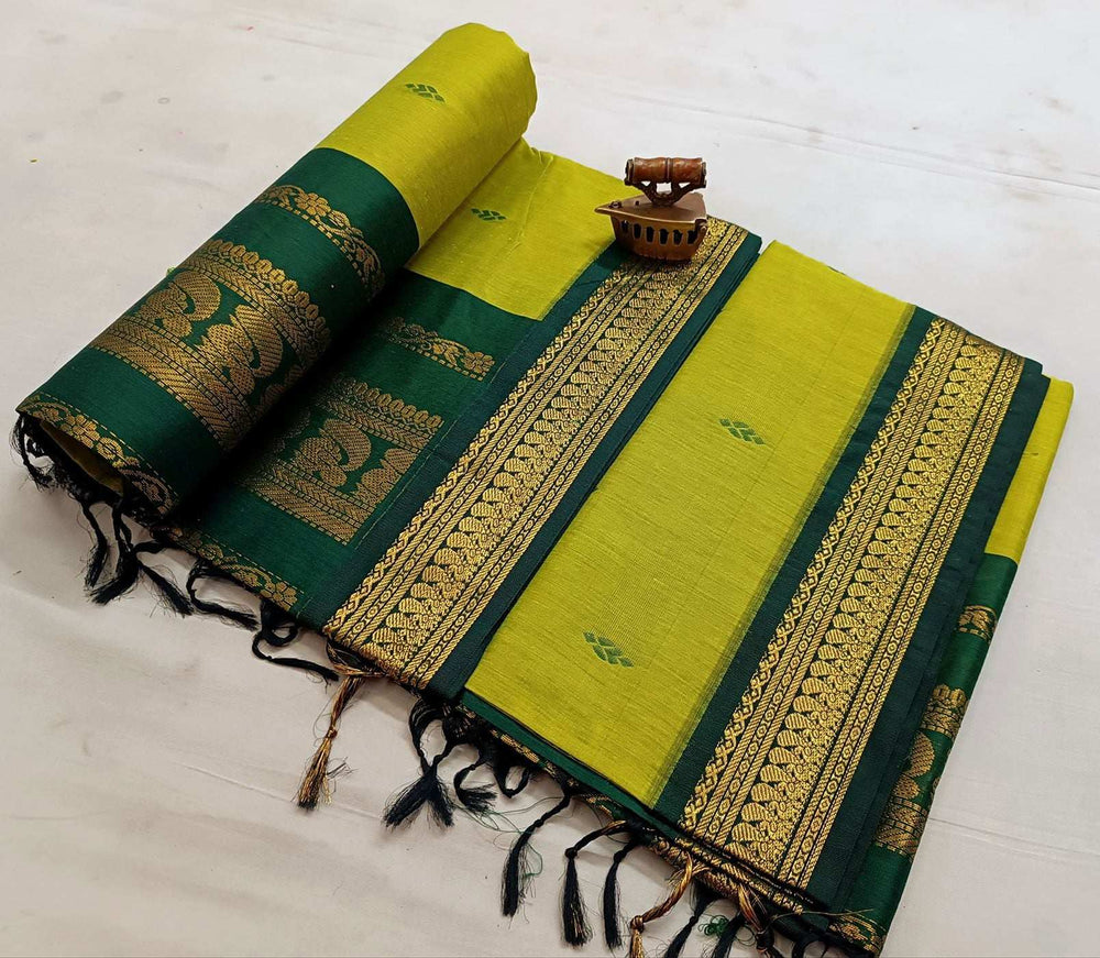 Lime green Gadwal saree paired with a dark green zari border and pallu
