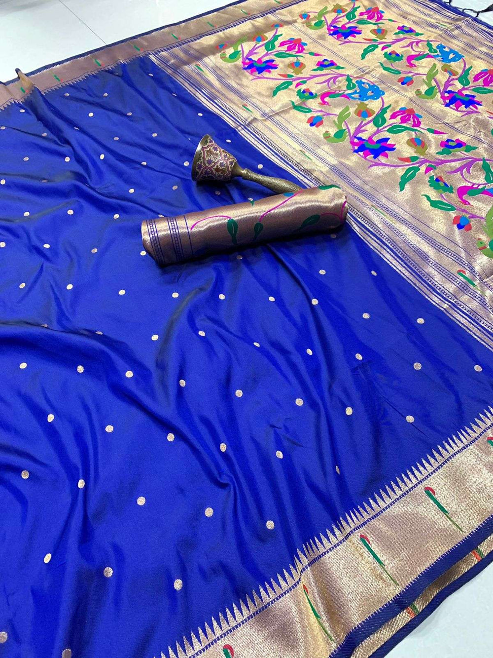 Royal blue Muniya Paithani saree with zari bootis and a gold temple-pattern border