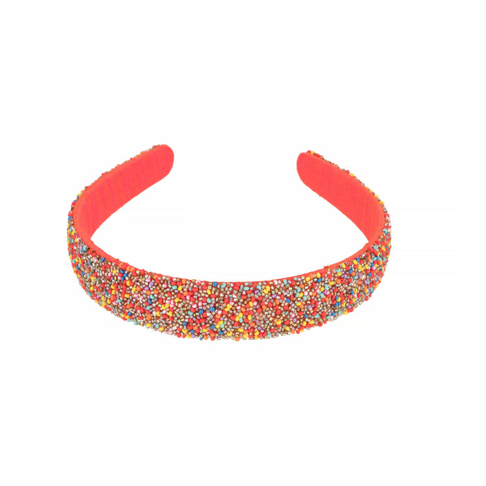 Neon beads headband seen straight on, coral band fully covered in tiny multicolour beads