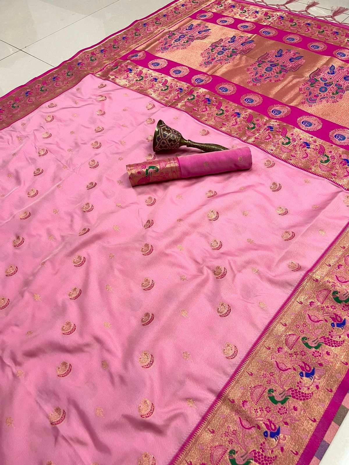 Soft pink colourway with rani pink border and gold zari peacock pallu