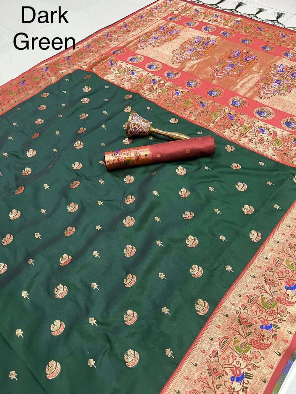 Dark green Paithani saree, red peacock border and zari bootis on the body