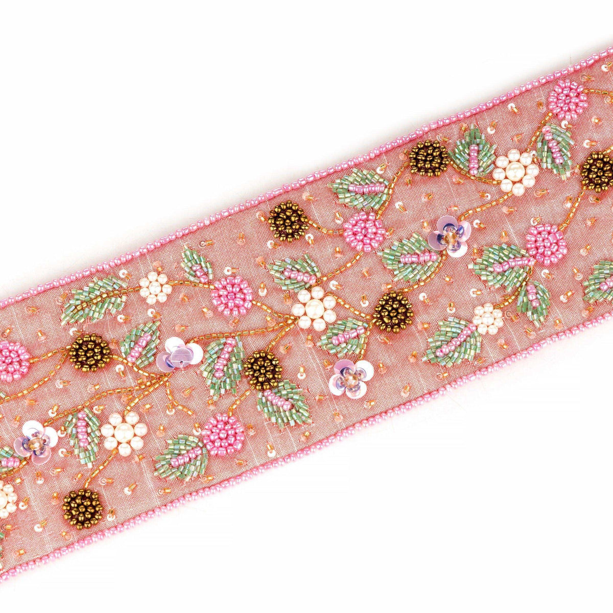 Close-up of the pink belt beadwork, clusters of flowers with green leaves and gold sequins